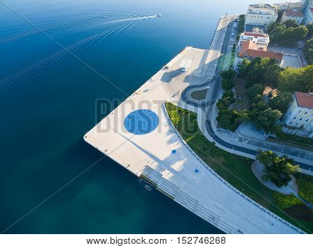 Aerial view of a square with a Greeting to the Sun the 22 m diameter circle which contains 300 multilayer glass panels with solar cells and light-emitting diodes.