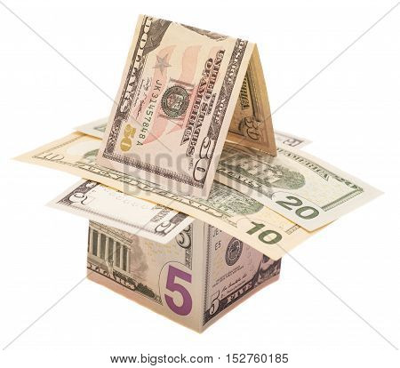 Houses from dollars banknotes. Isolated over white