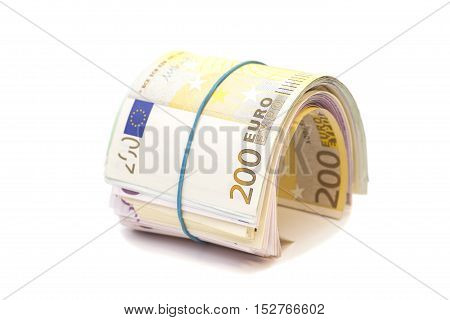 Twenty hundredth banknotes under rubber band isolated