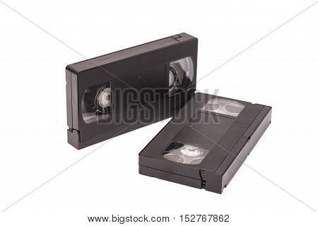 Old vhs video cassettes isolated on white
