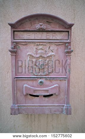 Beautiful old mailbox hanging on the wall