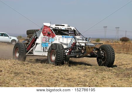 Forty Five Degree Close-up View Of Speeding White Bat Rally Car