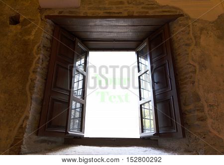 opening wood window with stone wall. Horizantal image