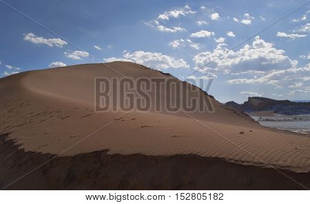 Beautiful sand dune with leading lines of sand into the atacama desert