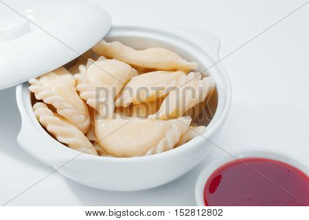 close up view of nice delicious ravioli on white back