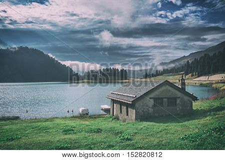 Amazing sunny morning at Champferersee lake in the Swiss Alps. Silvaplana village, Switzerland, Europe, toned like Instagram filter
