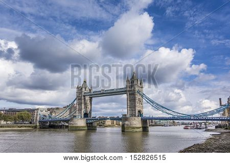 Tower Bridge on a cloudy day in London, UK.
