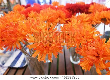 Bright and Beautiful Orange Artificial Daisy Gerbera Flowers in Glass Vase for Home and Office Decoration without The Care.