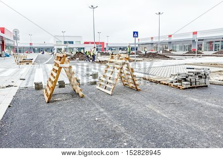 Zrenjanin Vojvodina Serbia - September 25 2015: Landscape transform into urban area people are working. View on building site.
