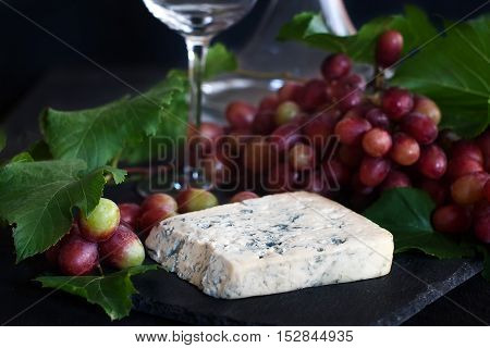 Blue Cheese With Grape Background