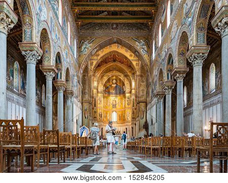 MONREALE ITALY - SEPTEMBER 8 2015: Interior of the Cathedral of Montreale or Duomo di Monreale near Palermo Sicily Italy. It is known for its mosaics on the theme of the Old and the New Testament