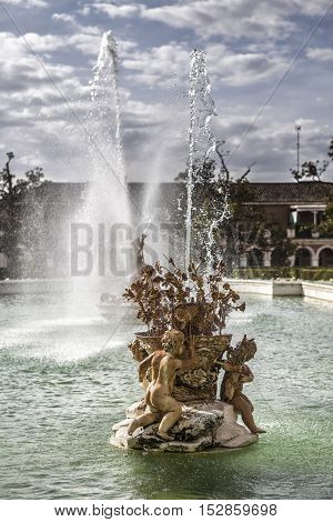 Aranjuez Spain - October 16 2016: Beautiful fountain near the Royal Palace of Aranjuez located in the Royal Site and town of Aranjuez UNESCO World Heritage site Madrid province Spain