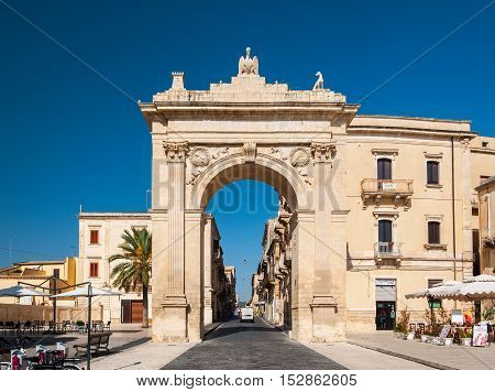 NOTO ITALY - SEPTEMBER 14 2015: Royal Gate or Arch of Porta Reale in Noto in Sicily Italy.