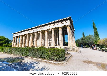 Athens, Greece - October 14, 2016: Tourists near temple of Hephaestus in Athens, Greece