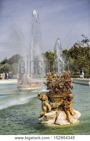 Aranjuez Spain - October 16 2016: Beautiful fountain near the Royal Palace of Aranjuez located in the Royal Site and town of Aranjuez UNESCO World Heritage site Madrid province Spain