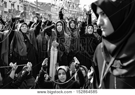 Istanbul Turkey - October 11 2016: Muslims worldwide marks Ashura Istanbul Shiite community. Turkish Shia Muslims mourning for Imam Hussain. Caferis take part in a mourning procession marking the day of Ashura in Istanbul's Kucukcekmece district Turkey on