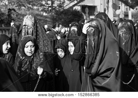 Istanbul Turkey - October 11 2016: Muslims worldwide marks Ashura Istanbul Shiite community. Turkish Shia Muslims mourning for Imam Hussain. Caferis take part in a mourning procession marking the day of Ashura in Istanbul's Kucukcekmece district Turkey on