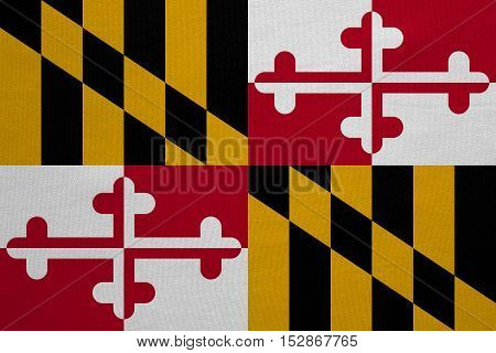 Flag of the US state of Maryland. American patriotic element. USA banner. United States of America symbol. Maryland official flag with real detailed fabric texture illustration. Accurate size colors