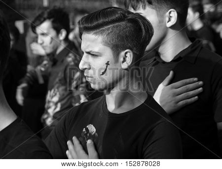 Istanbul Turkey - October 11 2016: Muslims worldwide marks Ashura Istanbul Shiite community. Turkish Shia Muslims mourning for Imam Hussain. Caferis take part in a mourning procession marking the day of Ashura in Istanbul's Kucukcekmece district Turkey on