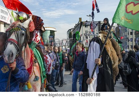 Istanbul Turkey - October 11 2016: Muslims worldwide marks Ashura Istanbul Shiite community. Turkish Shia Muslims mourning for Imam Hussain. Caferis take part in a mourning procession marking the day of Ashura in Istanbul's Kucukcekmece district Turkey on