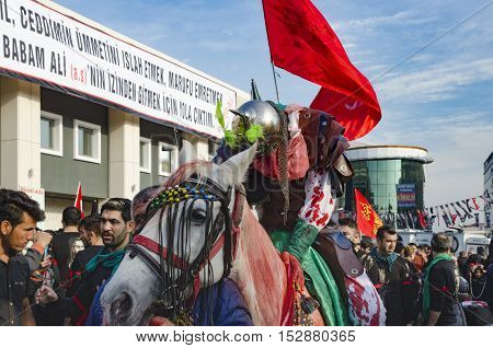 Istanbul Turkey - October 11 2016: Muslims worldwide marks Ashura Istanbul Shiite community. Turkish Shia Muslims mourning for Imam Hussain. Caferis take part in a mourning procession marking the day of Ashura in Istanbul's Kucukcekmece district Turkey on