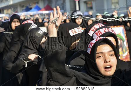 Istanbul Turkey - October 11 2016: Muslims worldwide marks Ashura Istanbul Shiite community. Turkish Shia Muslims mourning for Imam Hussain. Caferis take part in a mourning procession marking the day of Ashura in Istanbul's Kucukcekmece district Turkey on