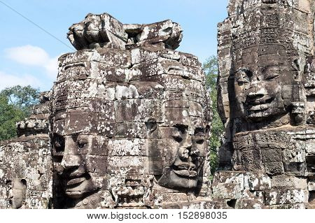 Smiling, gargantuan face at Angkor Thom, Siem Reap, Cambodia.