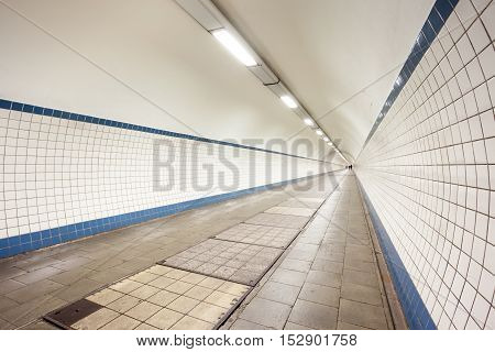 in a big city in Belgium there is a pedestrian bicycle tunnel