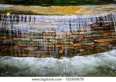Closeup of the beautiful waterfall in garden