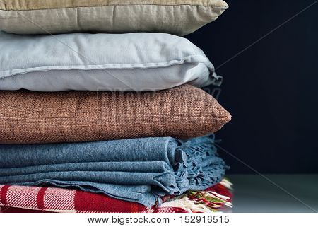 Colorful Pillows Stack On Dark Background
