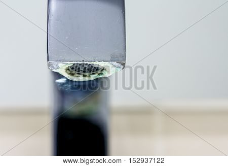 Limestone Deposit On A Tap
