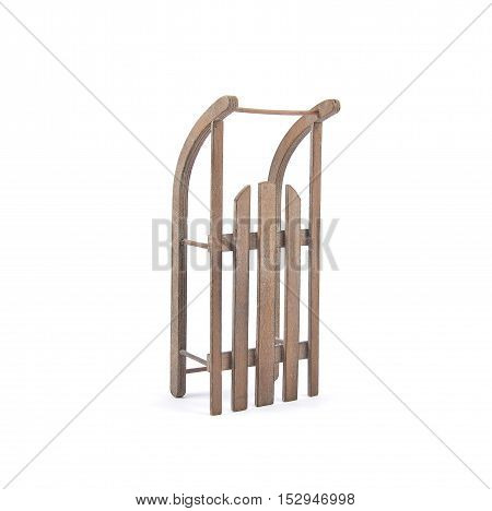 Colorful and crisp image of wodden sleigh on white background