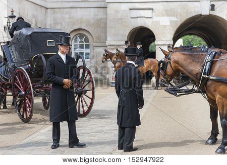 London, the UK - May 2016: Coachmen in Whitehall Yard