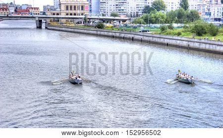 KALININGRAD RUSSIA - September 15.2008: Racing of rowers on oar boats in swimming to down the Pregolya River