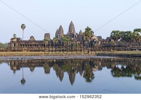 Angkor Wat and reflecting lake in sunset Siem Reap Cambodia