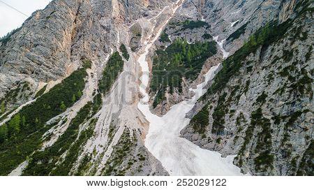 Aerial View Of The Mudflow With Snow High In The Alpine Mountains