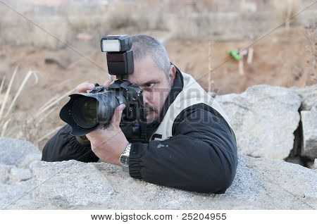 Válka fotograf pracuje.