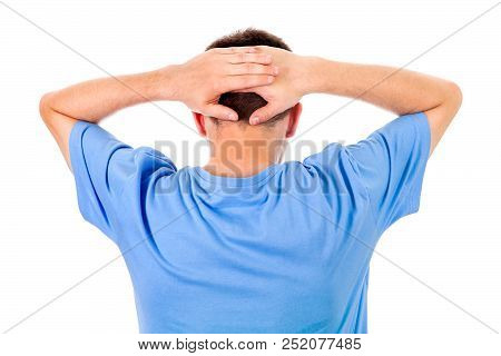 Rear View Of The Man With A Hands On The Back Of The Head