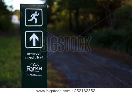 Frankston, Vic / Australia - Aug 2 2018: Straight Arrow And Running Sign At Park