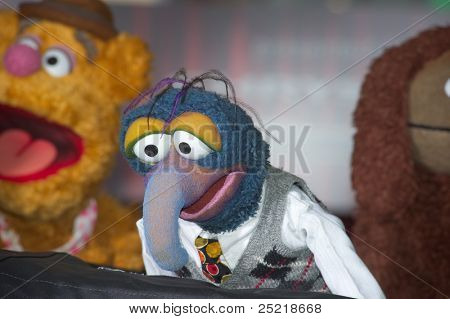 HOLLYWOOD, CA - NOVEMBER 12: Muppet characters arrive at the Los Angeles premiere of 