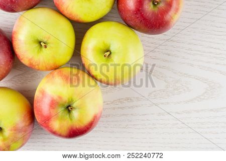 Lot Of Whole Fresh Red Apple James Grieve Variety Flatlay On Grey Wood