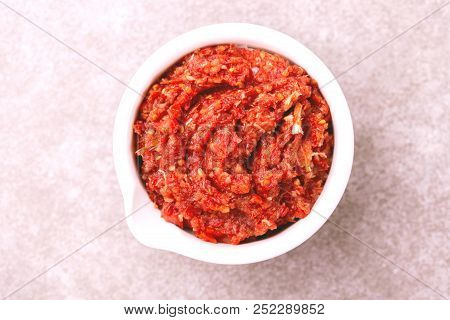 Traditional Maghrebi Hot Chili Pepper Sauce Paste Harissa. Adjika