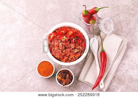 Traditional Maghrebi Hot Chili Pepper Sauce Paste Harissa. Adjika