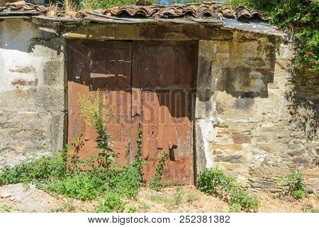 old wooden doors, ancient architecture inside Zamora, Spain, stone houses