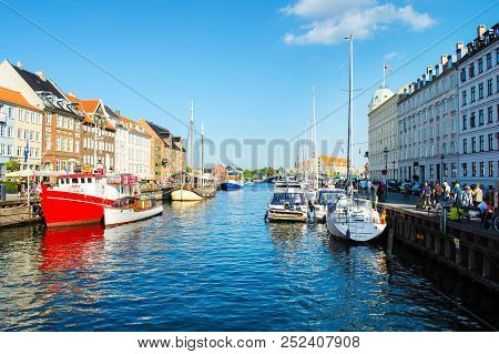 Copenhagen, Denmark - July 7, 2018. Streets Of Copenhagen. Beautiful Colorful Houses On The Canal. N