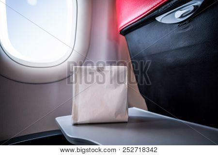 Airsick Nauseous Person In The Air Sickness Vomit Bag Prepared To Vomit