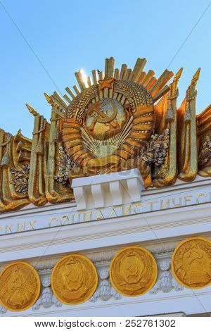 Moscow, Russia - August 01, 2018: Gilded Coat Of Arms Of Soviet Union With Coats Of Arms Of Union Re