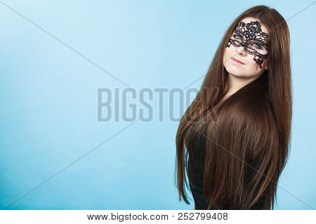 Pretty Mysterious Woman Wearing Black Eye Lace Mask Having Long Brown Hair.
