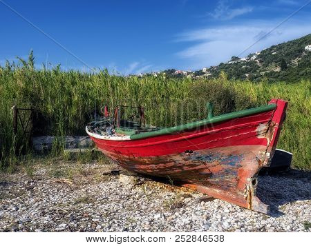 Old Red Fishing Boat In Polis Beach - Ithaka Island, Greece