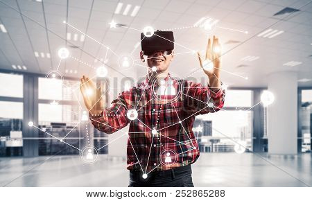 Guy Wearing Checked Shirt And Virtual Mask Reaching Hand To Touc